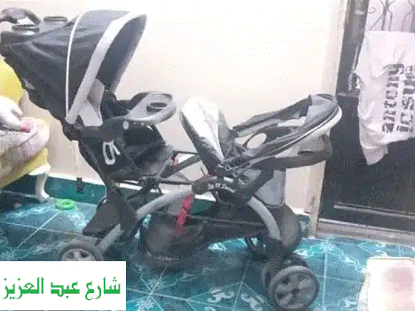 فرصة لا تعوض! عربية أطفال توأم Babytrend بحالة ممتازة...