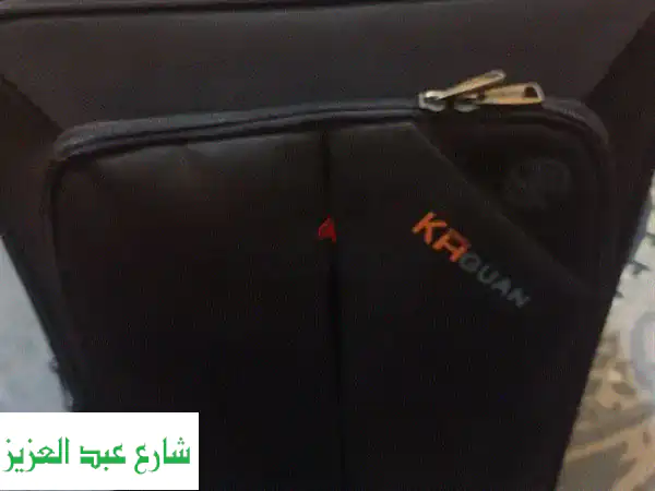 ارتقِ برحلاتك: شنطة سفر مستوردة أصلية | جودة لا...