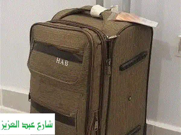 فرصة ذهبية: شنطة سفر أمريكية فاخرة (استعمال مرة...