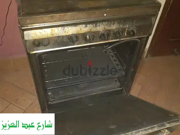 فرصة! بوتجاز يونيفرسال 60*60 سم بحالة ممتازة | فرن و4 عيون غاز طبيعي | حدائق المعادي