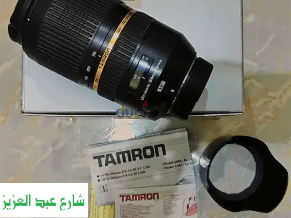 للبيع: عدسة Tamron 70-300mm VC USD Nikon | زوم احترافي Full Frame و Crop Frame بحالة 'كسر الزيرو'