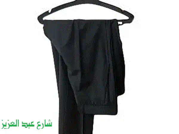 بدلة Hugo Boss أصلية سوداء مقاس 44 - أناقة وفخامة بحالة ممتازة جداً للرجل العصري