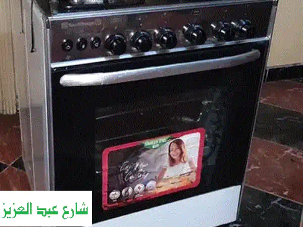 ارتقِ بمطبخك: بوتجاز يونيفرسال ٥ شعلة ٩٠ سم - بحالة ممتازة وبسعر استثنائي!