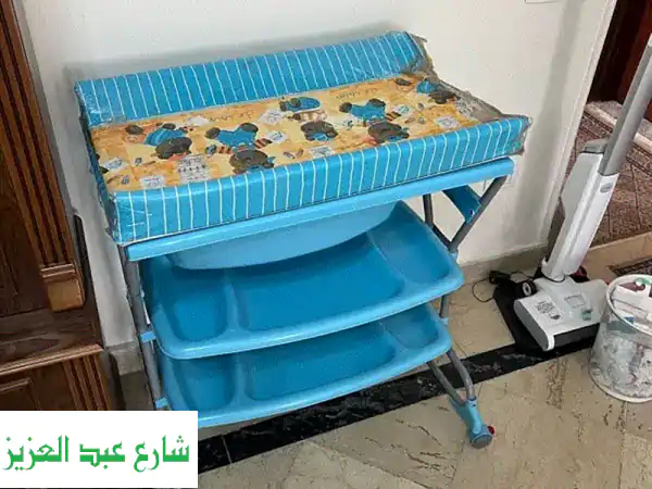 طاولة استحمام وتغيير حفاضات متكاملة: راحة وأمان...