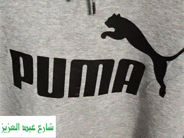 بوما أصلي جديد بالتكت مقاس M رجالي | أناقة رياضية جاهزة للانطلاق!