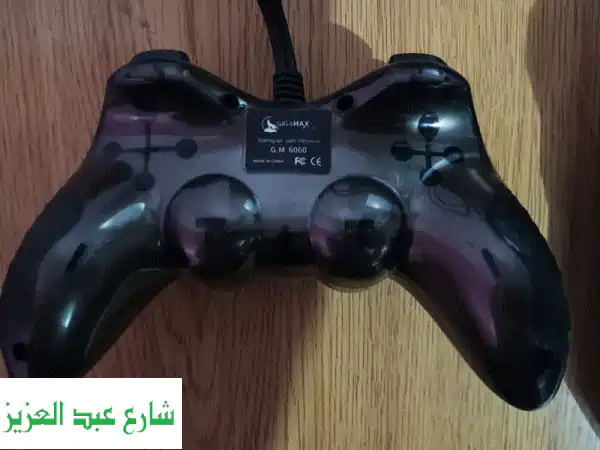 جيجاماكس G.M 6060: تحكم مثالي في ألعابك! (مستعمل بحالة ممتازة)