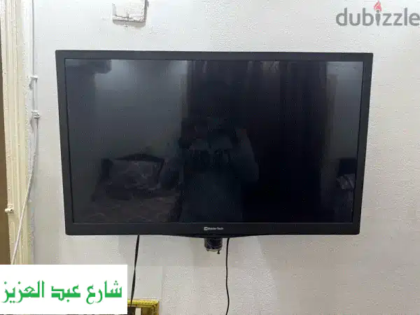 شاشة تلفزيون 32 بوصة بحالة ممتازة - سعر مغرٍ! (وسط البلد)