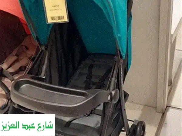 عربة أطفال جونيورز جديدة كلياً - سعر مغرٍ! (لم تُستخدم)