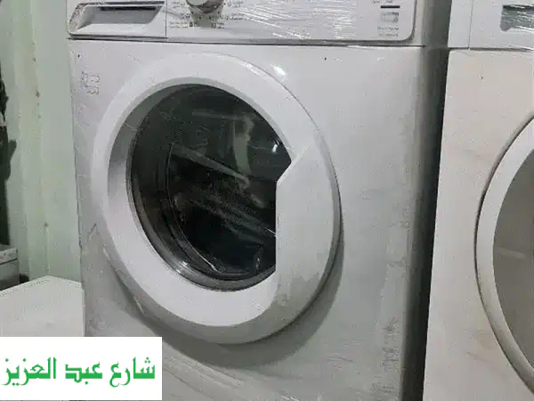 غسالة زانوسي 7 كيلو أوتوماتيك - كسر زيرو بحالة ممتازة! (مدينة نصر)