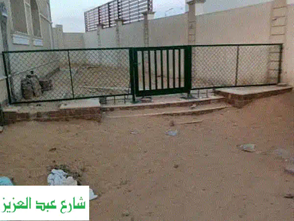 سُور شبك أخضر أنيق ومتين - لحماية منزلك وجمال حديقتك!