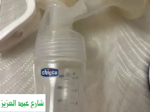 رضاعة يدوية شيكو + زجاجة رضاعة طبيعية - بحالة ممتازة!...