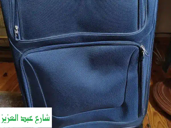 حقيبتا سفر فاخرِتان من Samsonite و American Tourister بحالة...