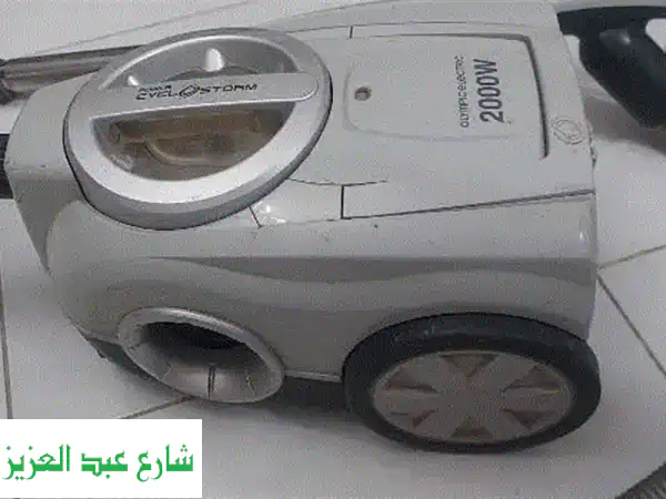 مكنسة أولمبيك 2000 وات - قوية وفعّالة! (حالة ممتازة)