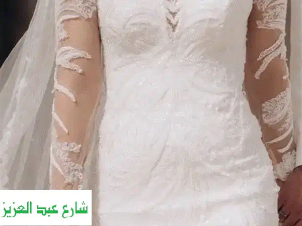 فستان زفافك الأول: لحظة سحرية تستحق فستانًا ملكيًا