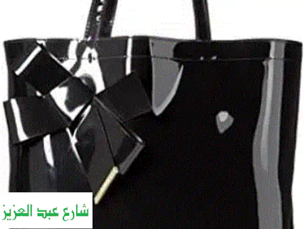 حقيبة يد سوداء أنيقة من Ted Baker - أناقة لا تُقاوم!