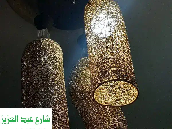 ثلاثية الأضواء الساحرة: نجفة نيكل ذهبية فاخرة بـ 500 فقط!