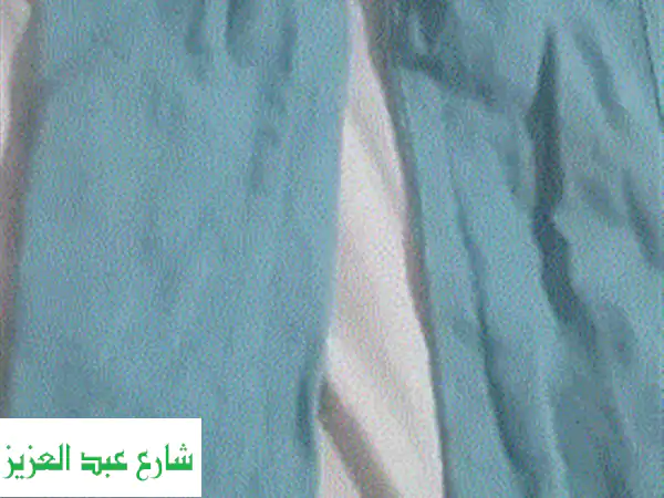 جاكيت زيتي دافئ بحالة ممتازة - مثالي لطفلك (7-8 سنوات)