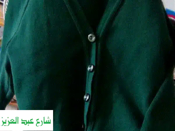 جاكيت زيتي دافئ بحالة ممتازة - مثالي لطفلك (7-8 سنوات)