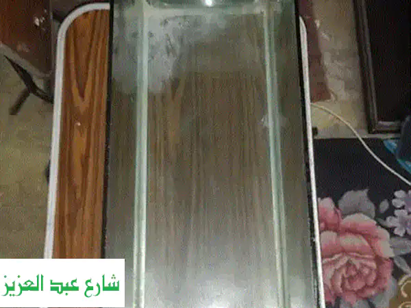 حوض سمك مستعمل بحالة ممتازة -  فرصة رائعة لعشاق...