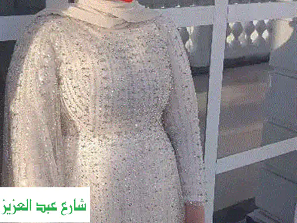 فستان زفاف ملكي فاخر - بحالة ممتازة! (مقاس ٦٥-٩٠ كجم)
