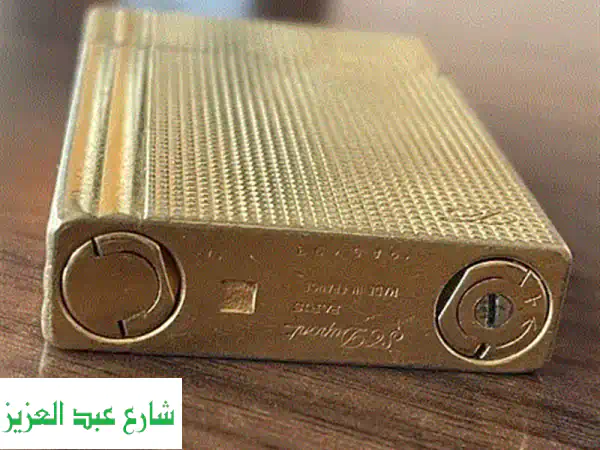 ولاعة ديبوز ذهبية أصلية - قطعة فنية نادرة للبيع!