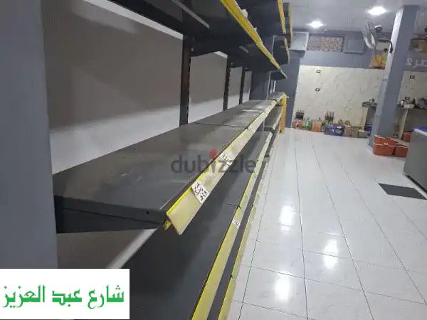 ارفف حديدية مستعملة - حالة ممتازة - مثالية لسوبرماركتك!
