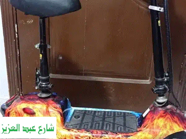 سكوتر كهربائي 36 وات - حالة ممتازة! قابل للتعديل و...
