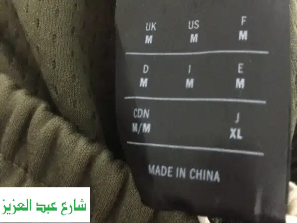 بنطال أديداس Z.N.E.: دفء، راحة، وروح الفريق - مثالي للتدريب والتشجيع