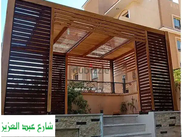 برجولات وأسوار خشب التجمع
