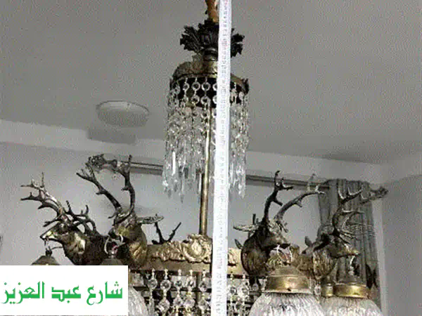 إضاءة ملكية ساحرة: نجفة نحاس 