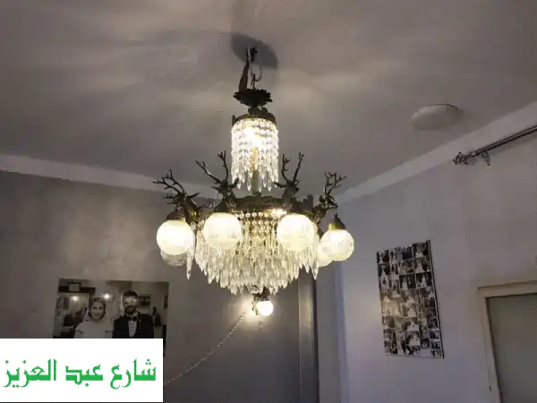 إضاءة ملكية ساحرة: نجفة نحاس 