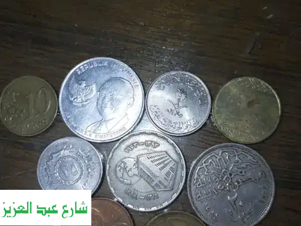 اكتشف كنوز الزمن: عملات نادرة، فضية (80s/90s)، وتذاكر تاريخية - جديد وقديم يجمع الهواة!