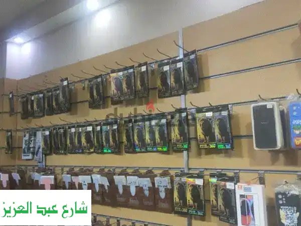 فرصة ذهبية استثمارية: محل موبايلات واكسسوارات...