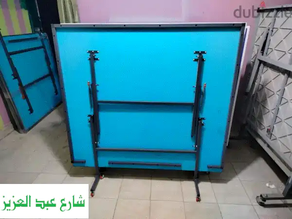 ارفع مستوى لعبك! طاولة بنج بونج (تنس طاولة) مصرية احترافية قابلة للطي بعجل | شاملة الملحقات + سعر الجملة للمستهلك | جسر السويس