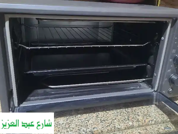 فرصة لا تعوض! ميكروويف جديد كلياً بحالة ممتازة جداً - بسعر 2500 فقط