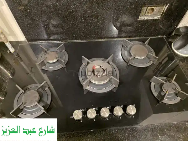 مسطح غاز 5 شعلة زجاج أسود 60x90: أناقة وأداء لا مثيل...