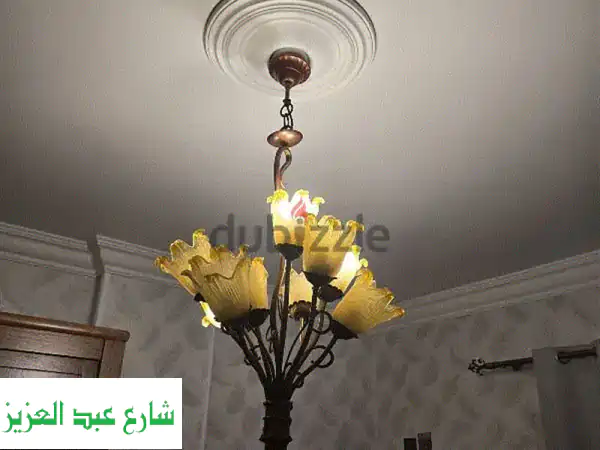 أضئ منزلك بفخامة! ✨ نجفة ستيل نحاسي 'بوكيه ورد'...