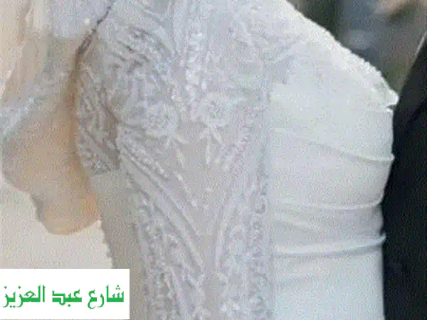 فستان زفاف ناعومي الفاخر للبيع | تصميم أحلامك الراقي والشيك بحالة ممتازة