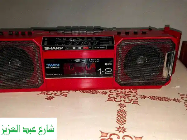 تسجيل ماركه شارب ( صنع اليابان ) باب واحد بحاله جيده +...