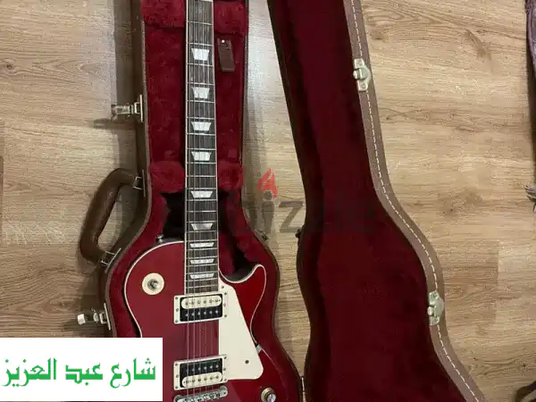 Gibson Les Paul Classic Cherry Blossom: أصالة، جمال وصوت أسطوري (مع العلبة الأصلية والرقم التسلسلي)