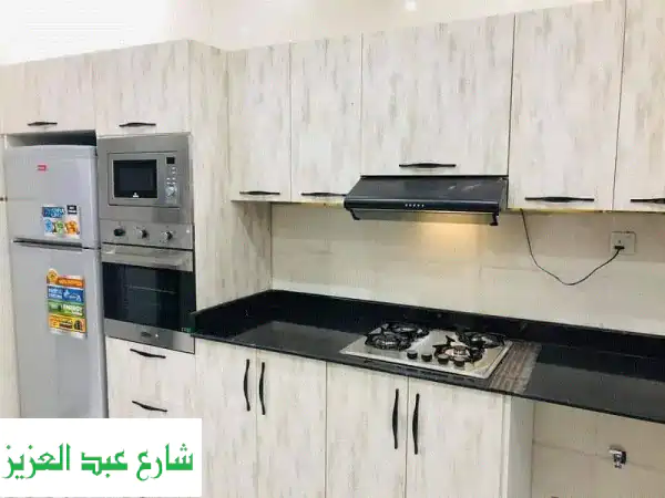 مطابخ مودرن خشب: سعر المتر المربع يناسب ميزانيتك!...