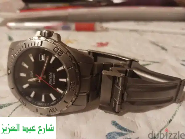 ألبا تيتانيوم: ساعة رجالية فاخرة | قوة، أناقة، ومقاومة للماء 100M