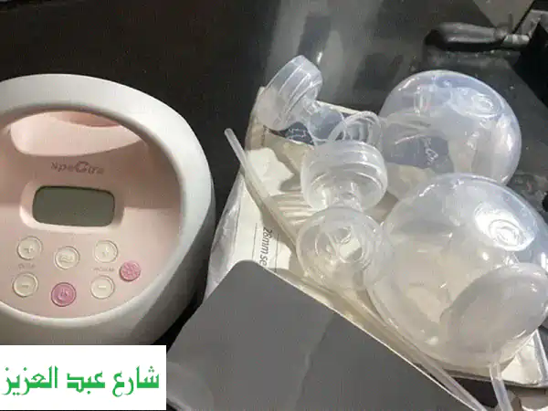 Spectra s2 double breast pump Used only 12 hours Excellent condition