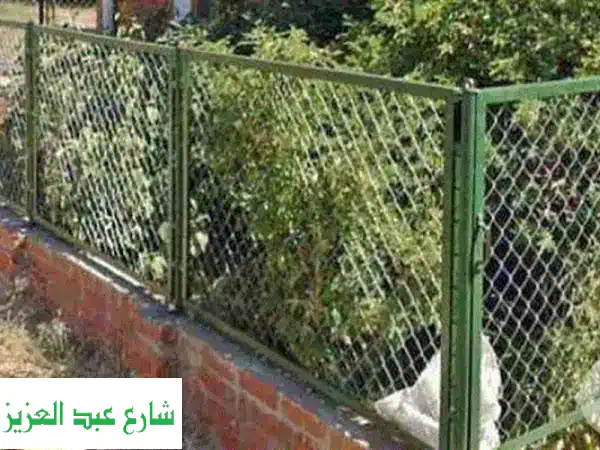 سور سلك أخضر مجلفن: أمان دائم لحديقتك وممتلكاتك | مقاوم للصدأ وتوريد وتركيب بجميع الألوان