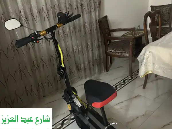 سكوتر كهربائي هكسينج 48V/13A - كالجديد بـ 30 كم فقط!...
