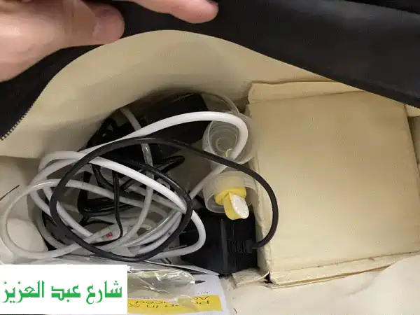 Breast pump Medela (Dual) with storage cups and bags