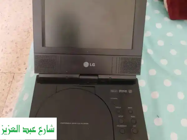 ترفيهك المتنقل بين يديك! مشغل LG DVD محمول شاشة 7...
