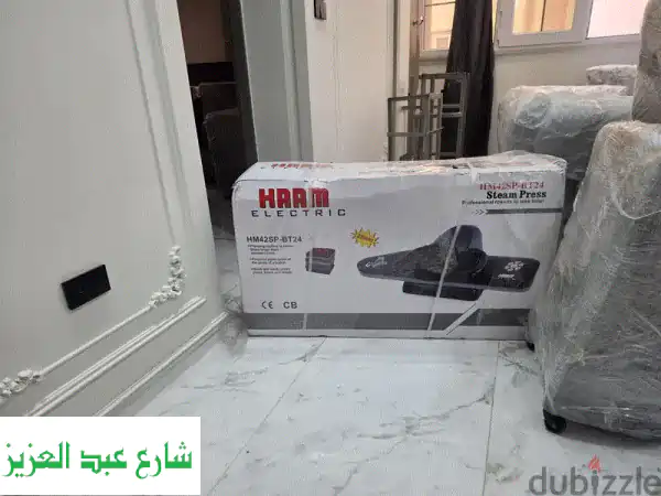 مكواة ضغط بخار هام